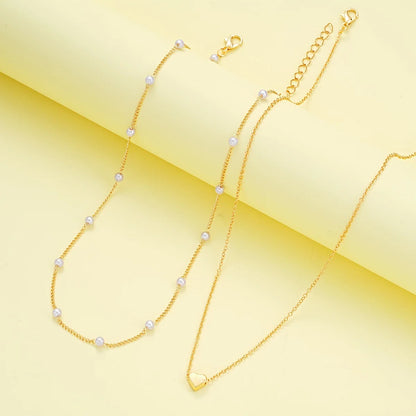 Chic Pearl Heart Jewelry Set for Women – Gold Necklace & Bracelet